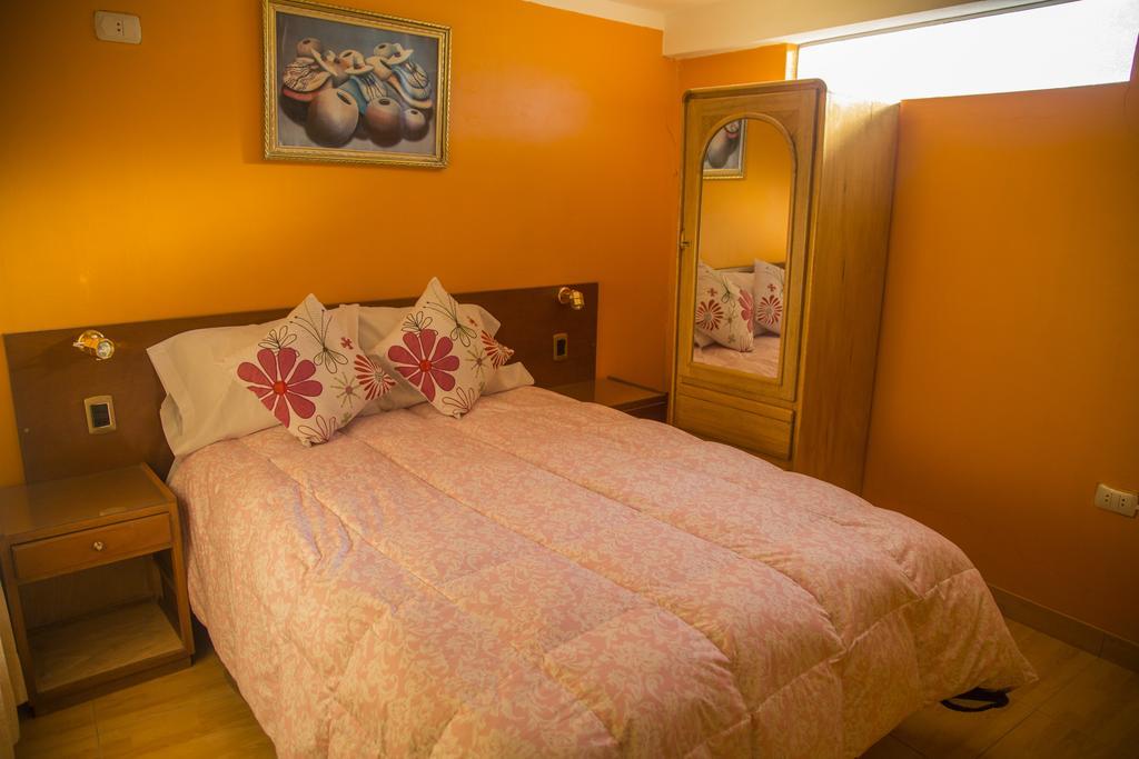 Wisny Inn Puno Chambre photo