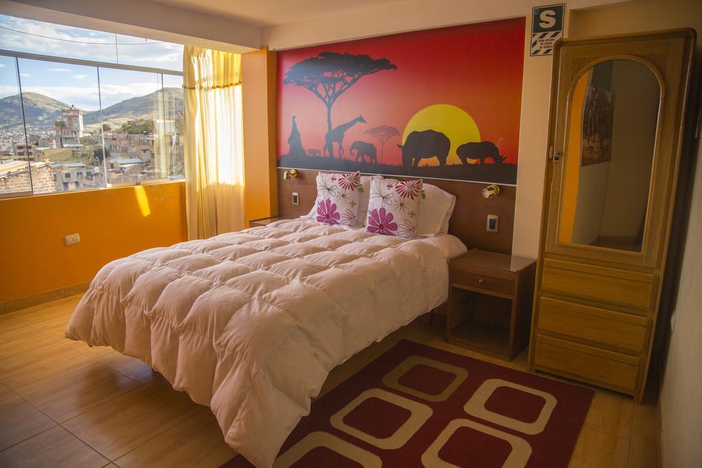 Wisny Inn Puno Chambre photo