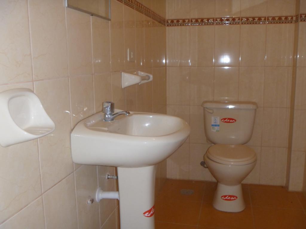 Wisny Inn Puno Chambre photo
